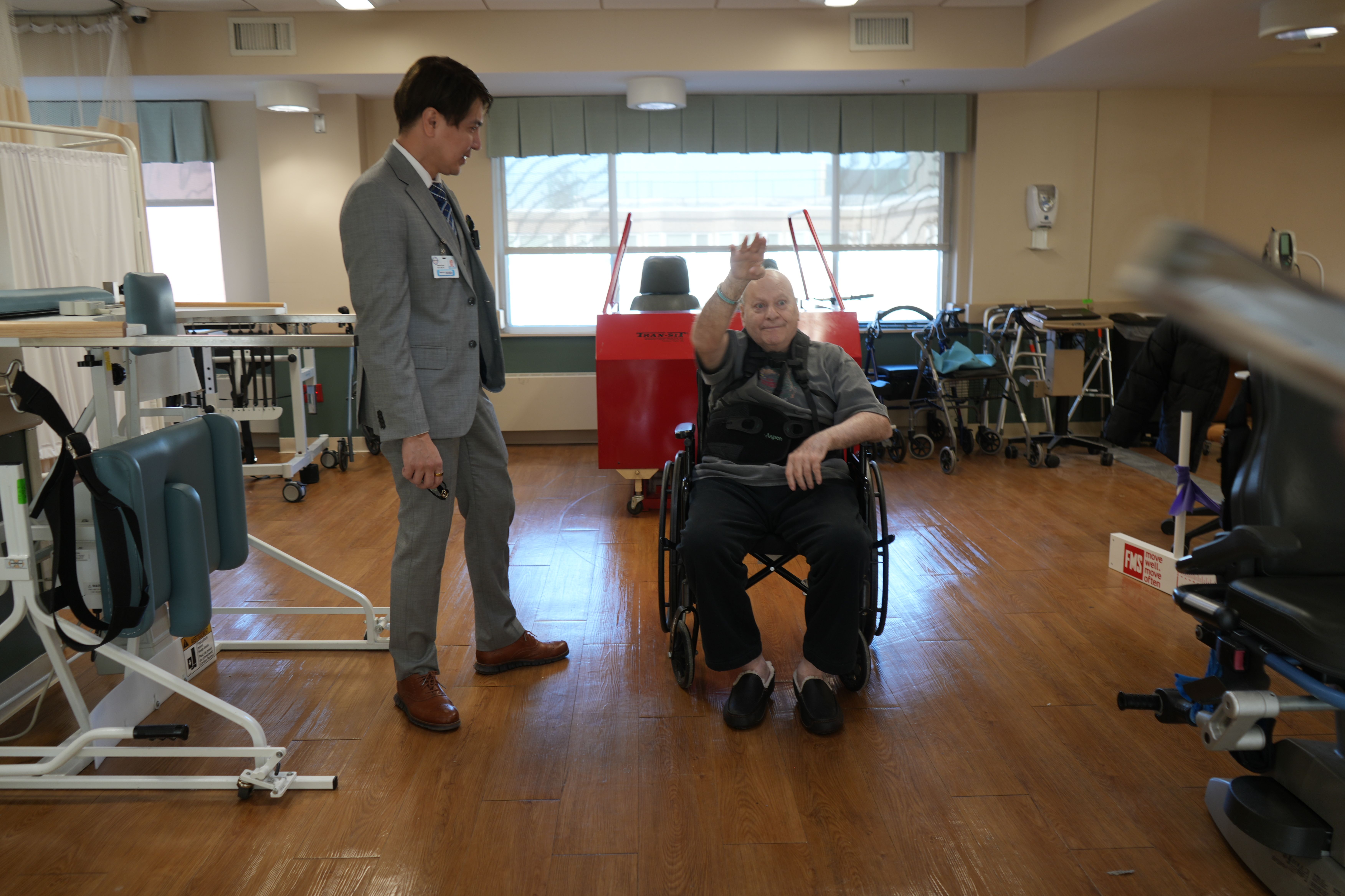 Elderly Man In Wheelchair With Mark Sanchez