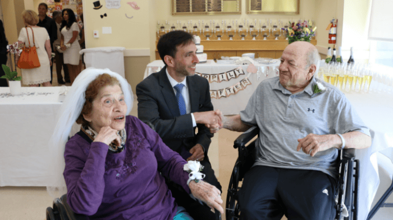 Eleven Couples Renew Wedding Vows at ‘I Do, Take Two!’ Ceremony.png